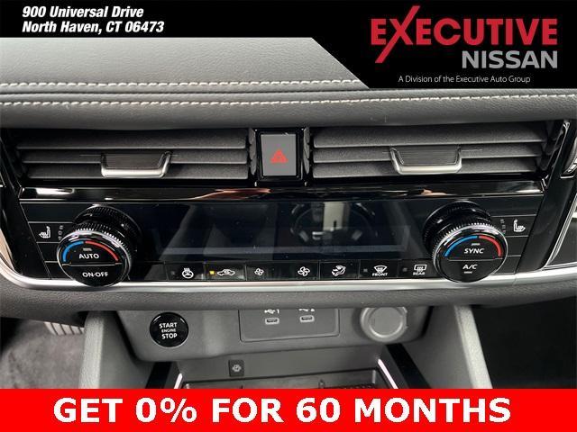 Photo of 2025 White / Black Nissan Rogue