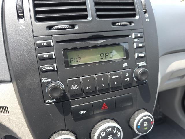 Photo of 2008 Ice Blue Metallic Kia Spectra