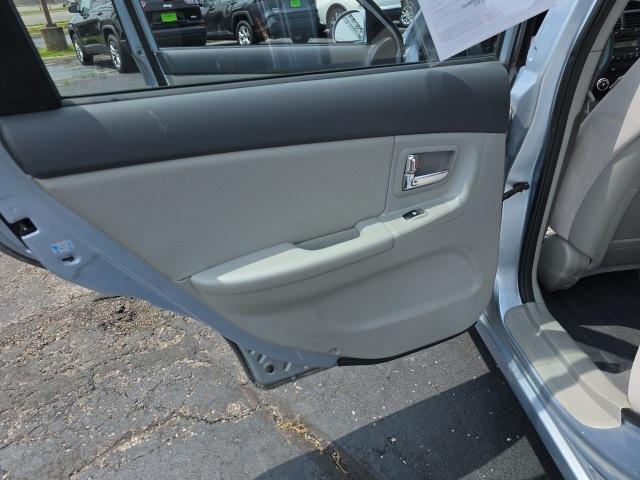 Photo of 2008 Ice Blue Metallic Kia Spectra