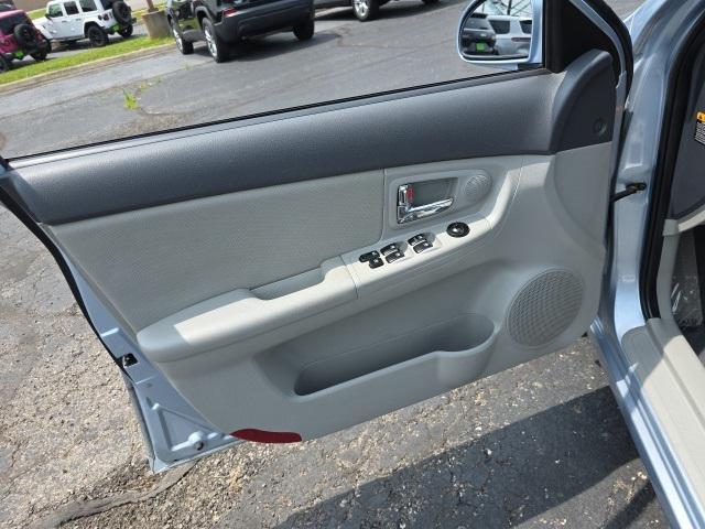 Photo of 2008 Ice Blue Metallic Kia Spectra