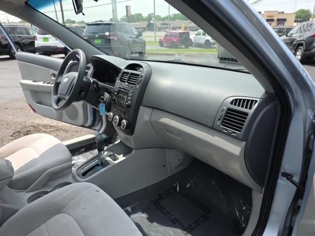 Photo of 2008 Ice Blue Metallic Kia Spectra