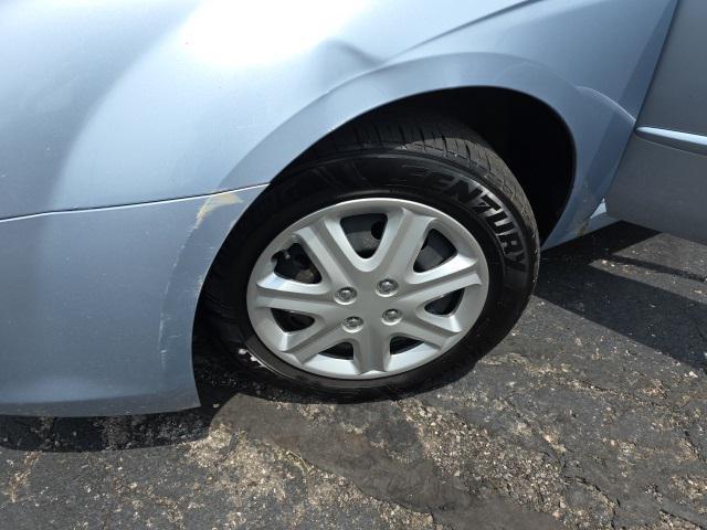 Photo of 2008 Ice Blue Metallic Kia Spectra