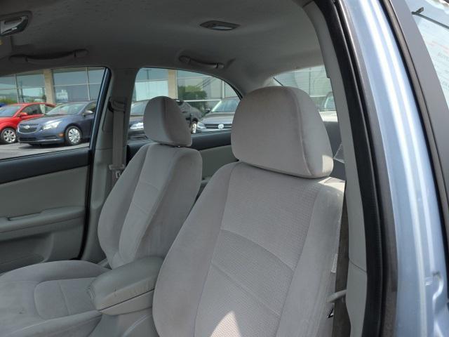 Photo of 2008 Ice Blue Metallic Kia Spectra