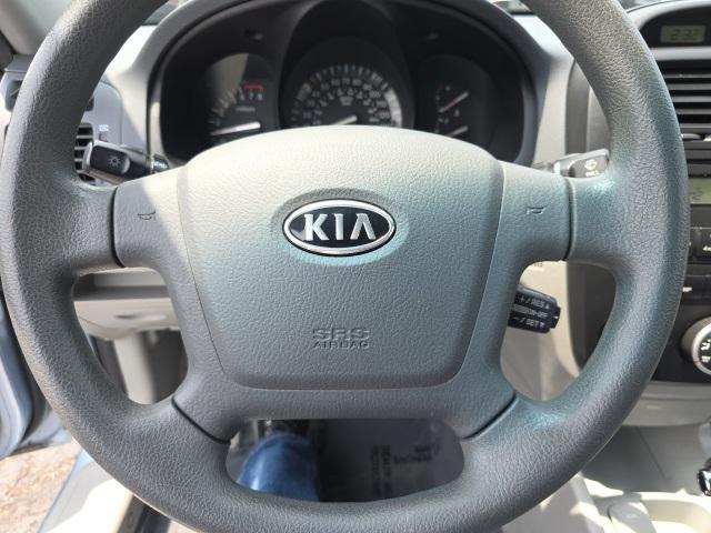 Photo of 2008 Ice Blue Metallic Kia Spectra