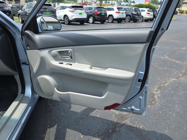 Photo of 2008 Ice Blue Metallic Kia Spectra