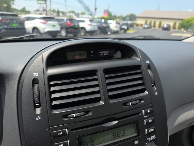 Photo of 2008 Ice Blue Metallic Kia Spectra