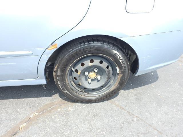 Photo of 2008 Ice Blue Metallic Kia Spectra