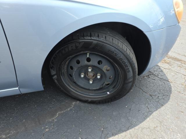 Photo of 2008 Ice Blue Metallic Kia Spectra