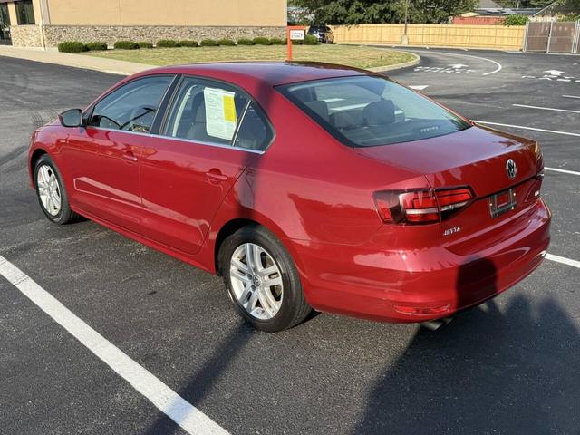 Photo of 2017 Cardinal Red Metallic Volkswagen Jetta