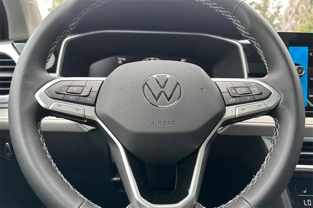 Photo of 2025 Deep Black Pearl Volkswagen Taos