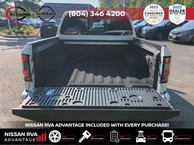 Photo of 2025 Glacier White Nissan Frontier