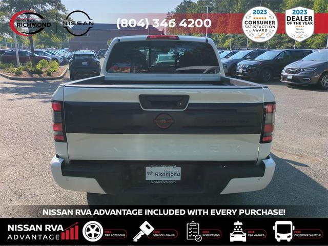 Photo of 2025 Glacier White Nissan Frontier