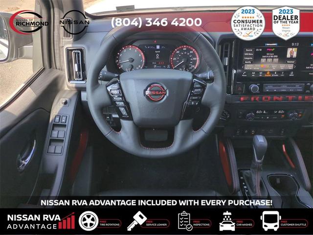 Photo of 2025 Glacier White Nissan Frontier