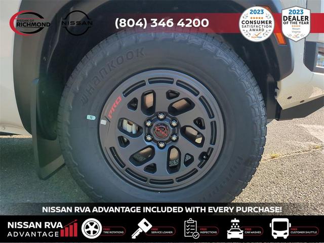 Photo of 2025 Glacier White Nissan Frontier