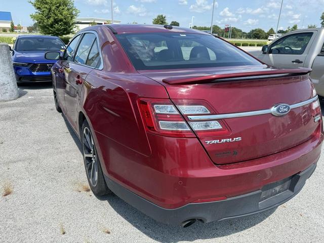 Photo of 2016 Ruby Red Metallic Tinted Clearcoat Ford Taurus