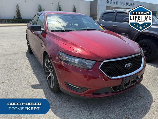 Photo of 2016 Ruby Red Metallic Tinted Clearcoat Ford Taurus