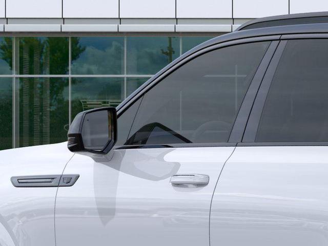Photo of 2026 Vibrant White Cadillac Escalade IQ