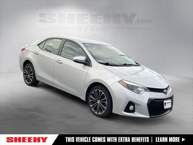 Photo of 2014 Classic Silver Metallic Toyota Corolla