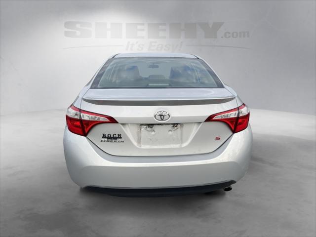 Photo of 2014 Classic Silver Metallic Toyota Corolla