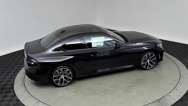Photo of 2024 Black Sapphire Metallic BMW 230