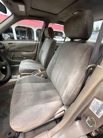 Photo of 2002 Gold Toyota Corolla