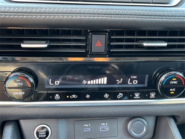 Photo of 2022 Scarlet Ember Tintcoat Nissan Rogue