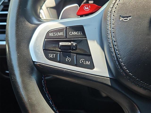Photo of 2024 Black Sapphire Metallic BMW X4 M
