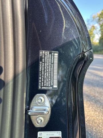 Photo of 2024 Jet Black Metallic Porsche 718 Boxster