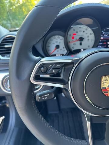 Photo of 2024 Jet Black Metallic Porsche 718 Boxster