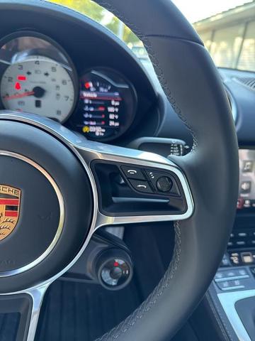 Photo of 2024 Jet Black Metallic Porsche 718 Boxster