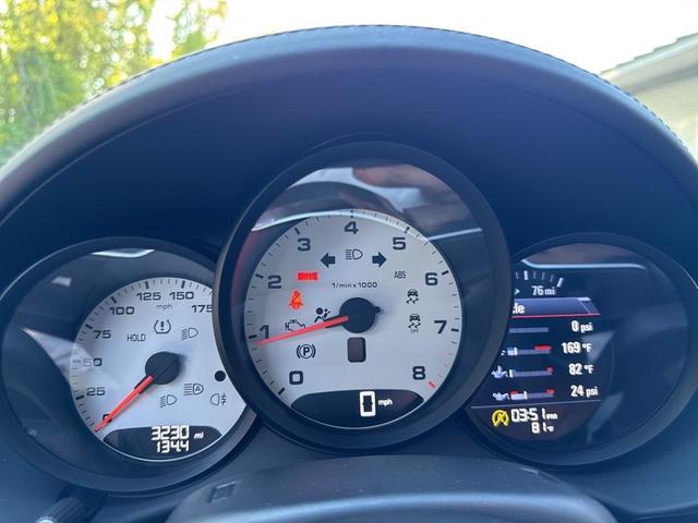 Photo of 2024 Jet Black Metallic Porsche 718 Boxster