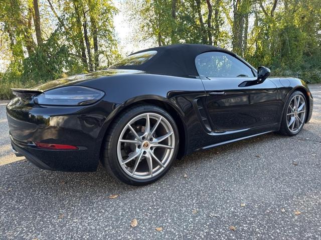 Photo of 2024 Jet Black Metallic Porsche 718 Boxster