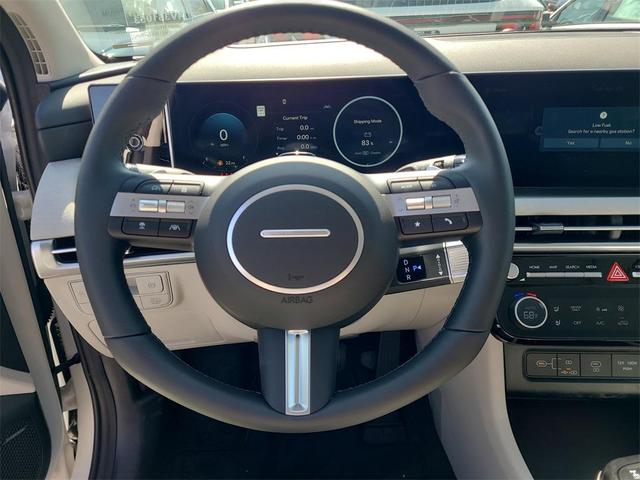 Photo of 2025 Creamy White Pearl Hyundai TUCSON Hybrid