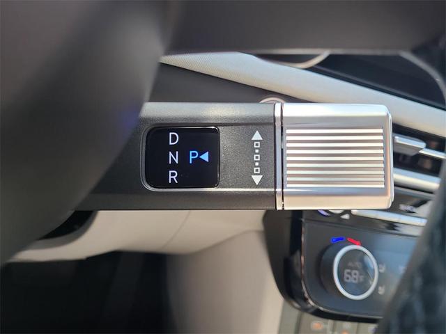 Photo of 2025 Creamy White Pearl Hyundai TUCSON Hybrid