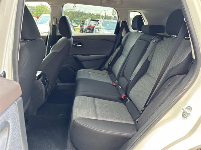 Photo of 2023 Pearl White Tricoat Nissan Rogue