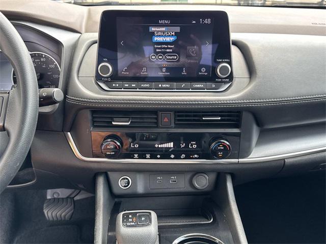 Photo of 2023 Pearl White Tricoat Nissan Rogue