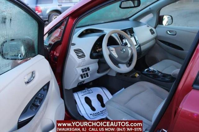 Photo of 2011 Cayenne Red Nissan Leaf