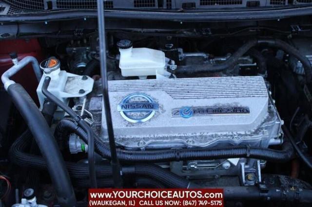 Photo of 2011 Cayenne Red Nissan Leaf