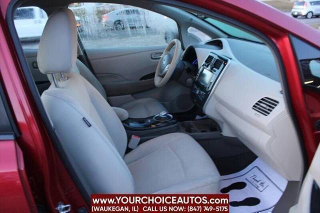 Photo of 2011 Cayenne Red Nissan Leaf