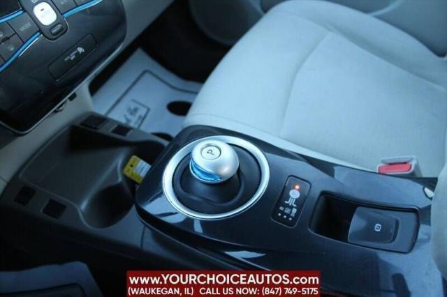 Photo of 2011 Cayenne Red Nissan Leaf