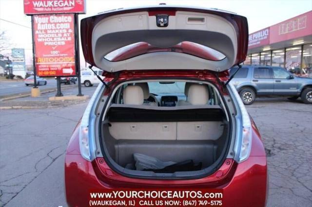Photo of 2011 Cayenne Red Nissan Leaf