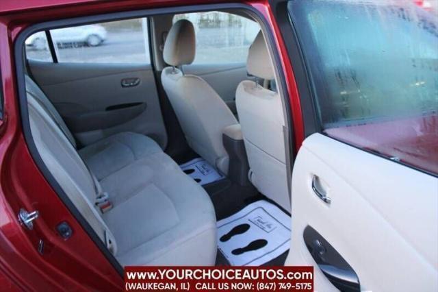 Photo of 2011 Cayenne Red Nissan Leaf