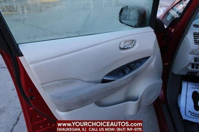 Photo of 2011 Cayenne Red Nissan Leaf