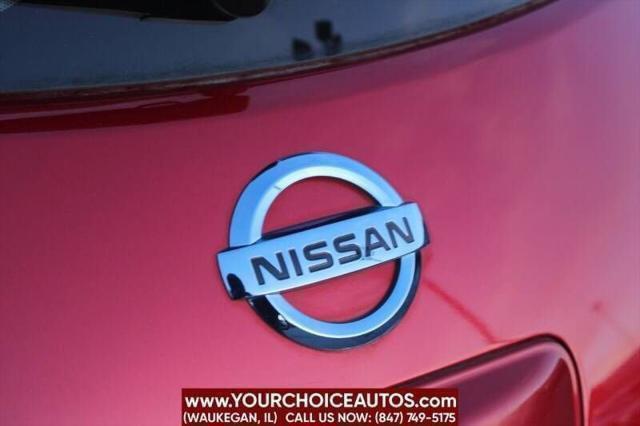 Photo of 2011 Cayenne Red Nissan Leaf