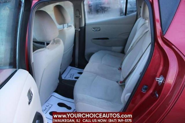 Photo of 2011 Cayenne Red Nissan Leaf