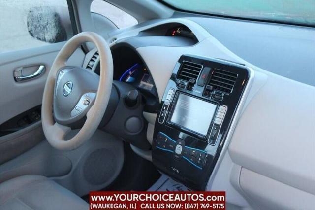 Photo of 2011 Cayenne Red Nissan Leaf