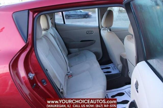 Photo of 2011 Cayenne Red Nissan Leaf