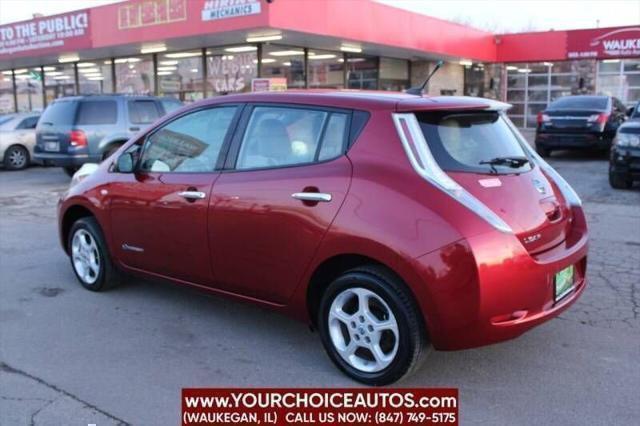 Photo of 2011 Cayenne Red Nissan Leaf