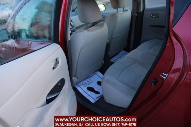 Photo of 2011 Cayenne Red Nissan Leaf