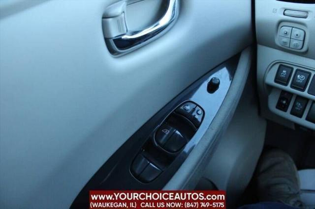 Photo of 2011 Cayenne Red Nissan Leaf